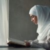 online quran memorization class with teacher guiding student